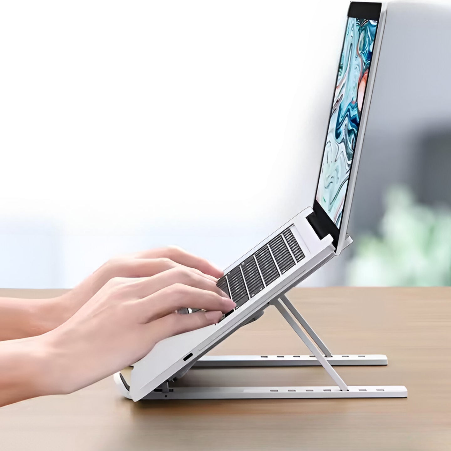 Soporte para Notebooks y Macbooks Retractil de Aluminio